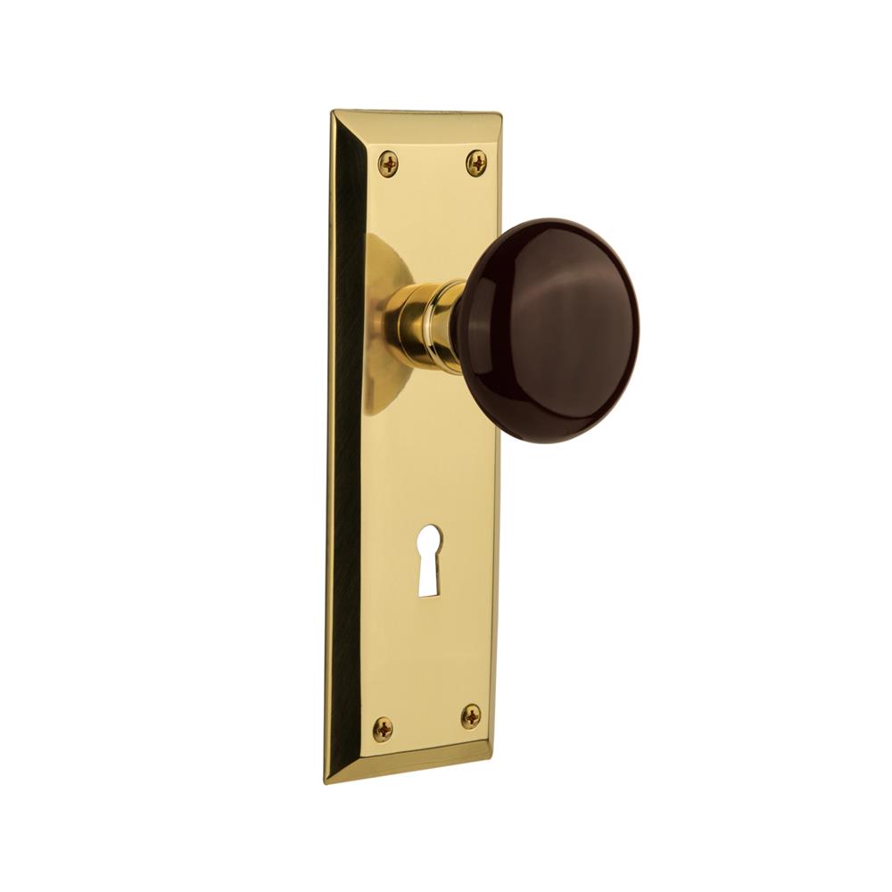 Nostalgic Warehouse NYKBRN Mortise New York Plate with Brown Porcelain Knob and Keyhole in Unlacquered Brass